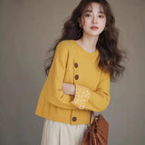 Laid-back Yellow Slanted-button Knit Undershirt Sweater